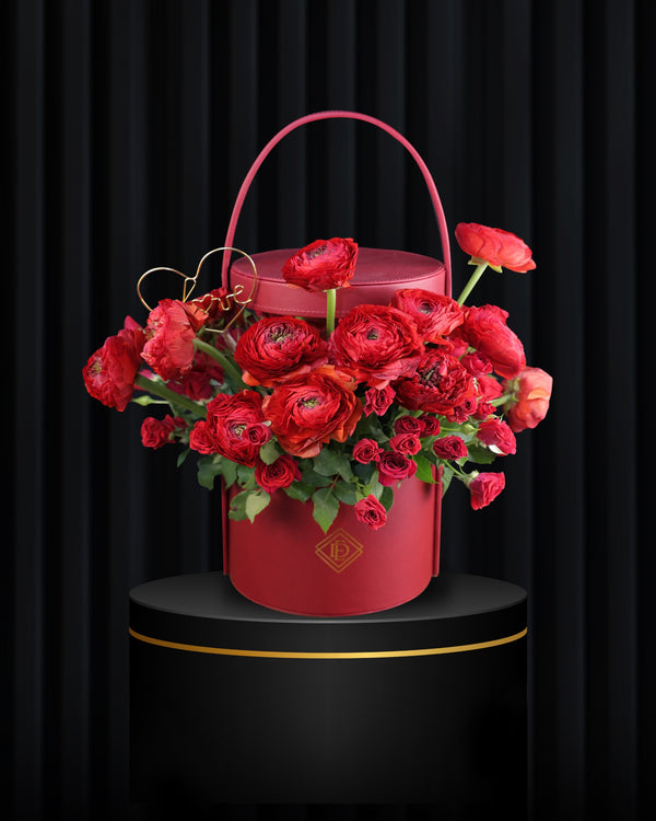 Evlai Signature Bag with Red Ranunculus & Spray Roses