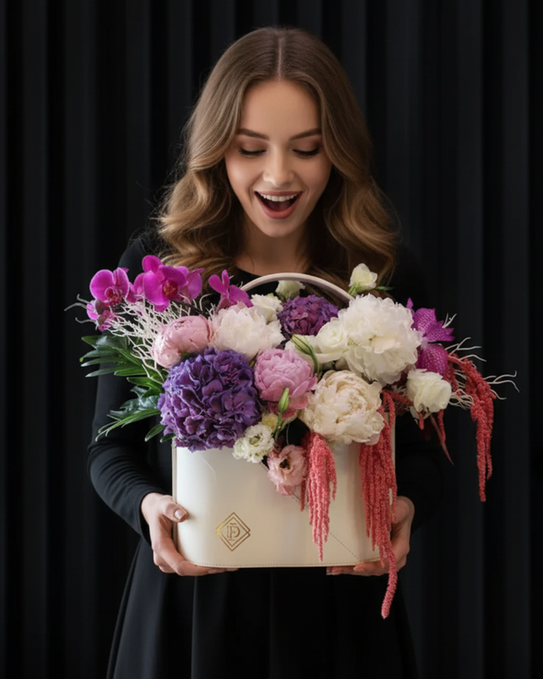 Orchid Reverie – White Leather Bag Flower Arrangement