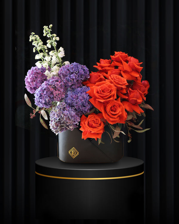 Crimson Elegance – Luxury Leather Bag Flower Arrangement